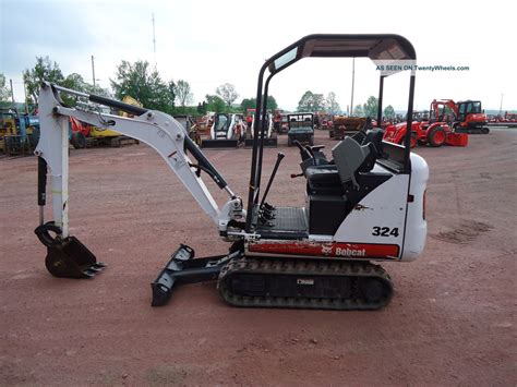 mini excavator with adjustable tracks bobcat|used bobcat mini excavators for sale near me.